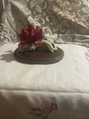 Saba ceramic flower figurine in red and cream on wooden base